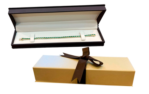 Emerald rings in The Natural Emerald Company custom made packaging