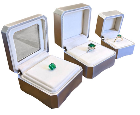 Emerald rings in The Natural Emerald Company custom made packaging